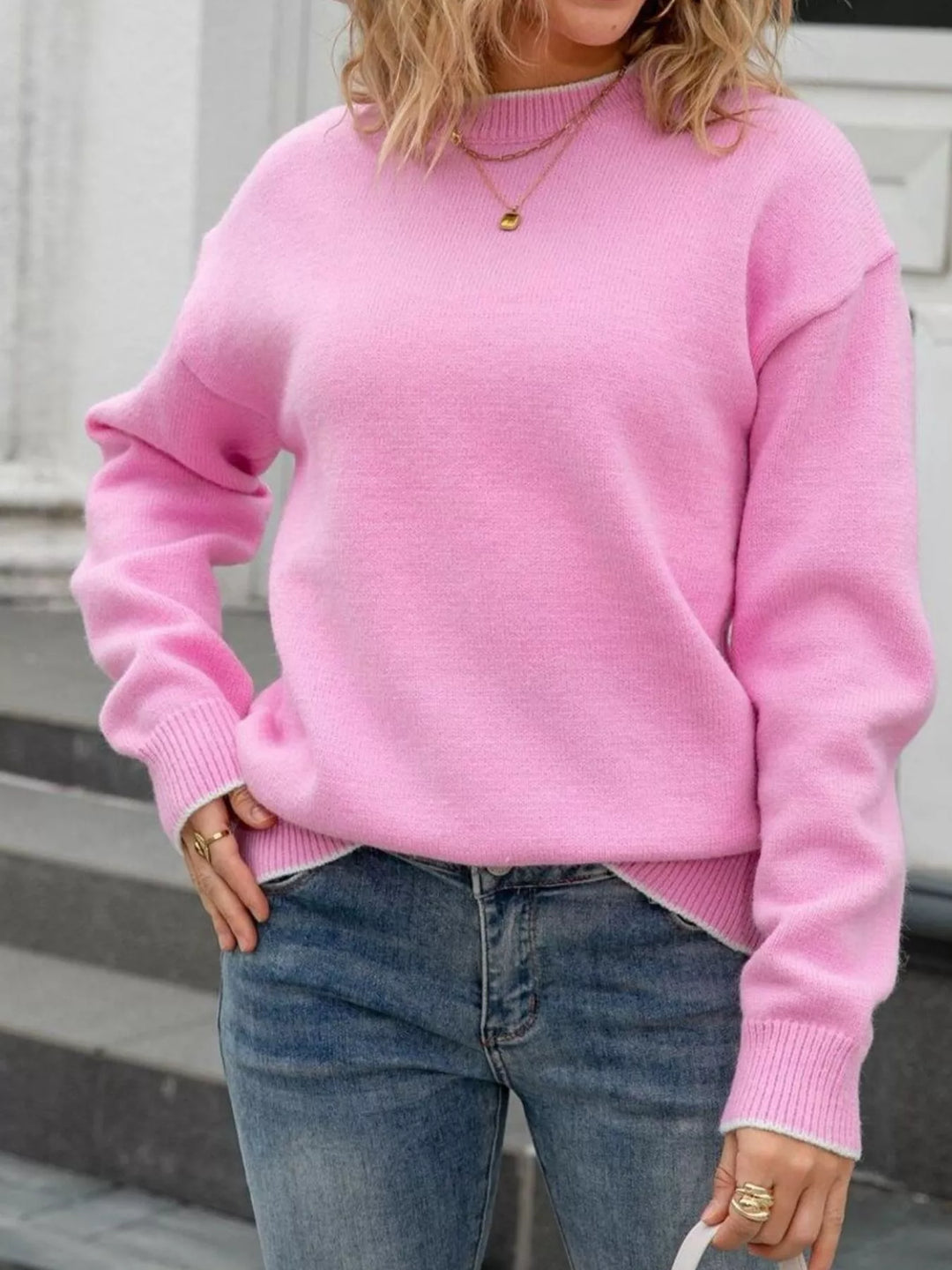 Bow-back knit sweater with ribbon ties and round neck