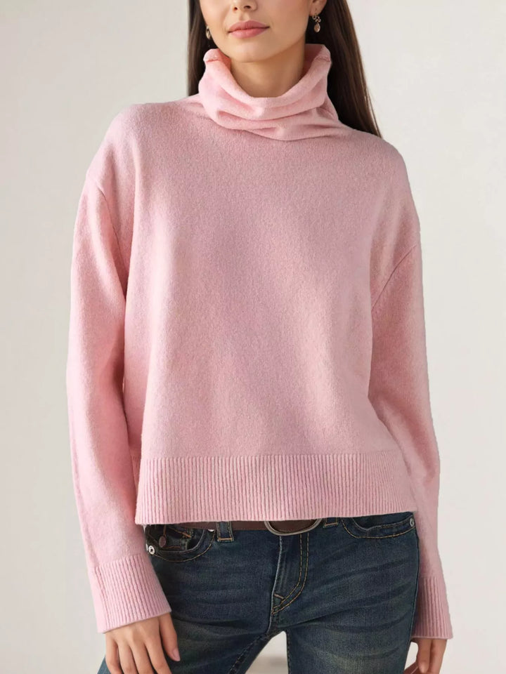 Pink Turtleneck drop shoulder sweater with ribbed hem