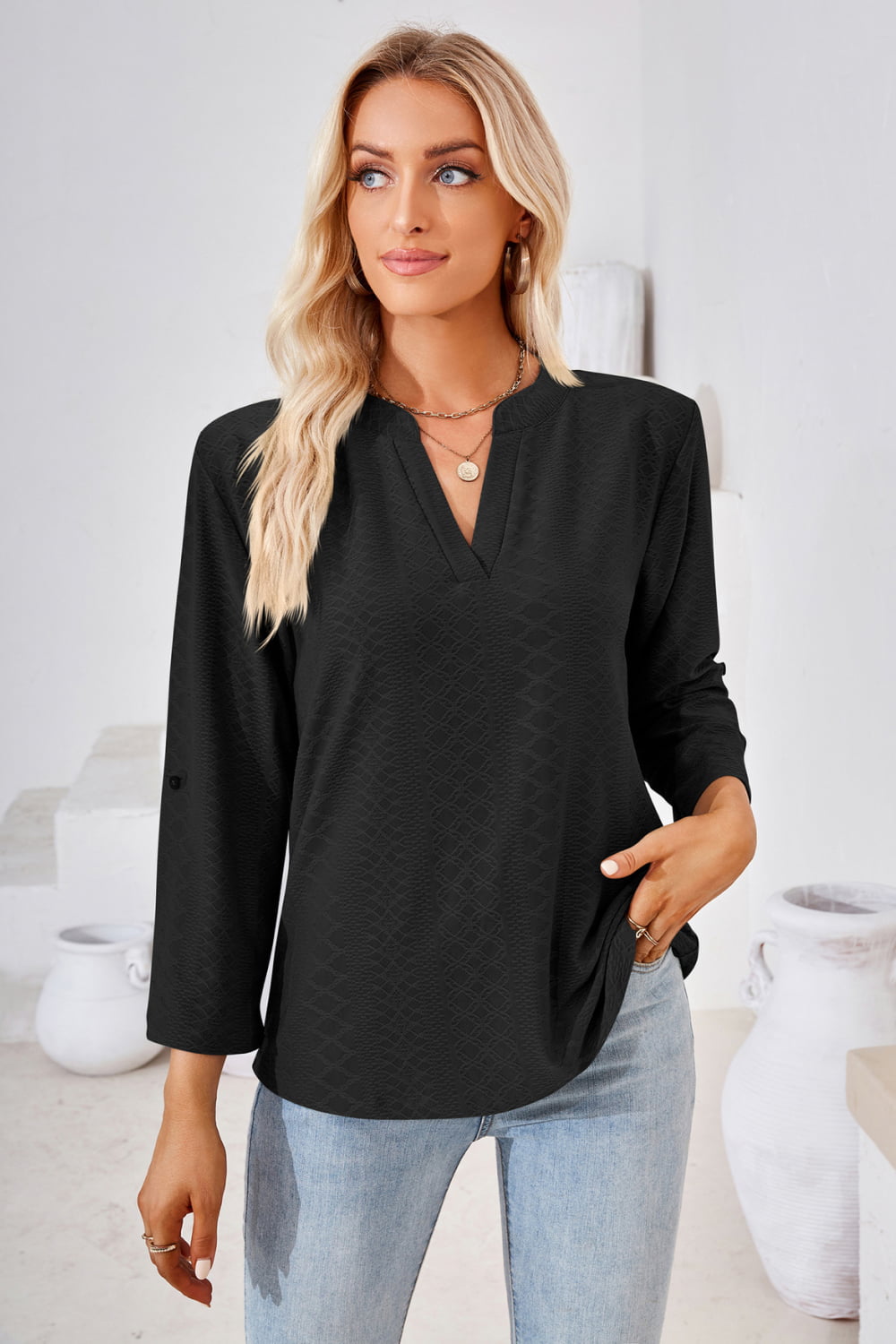 Black Textured split v-neck blouse with roll-tab sleeves