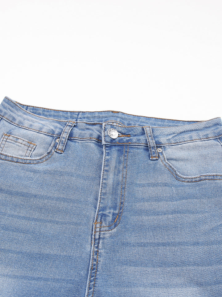 High-rise whiskered wash raw hem cropped jeans