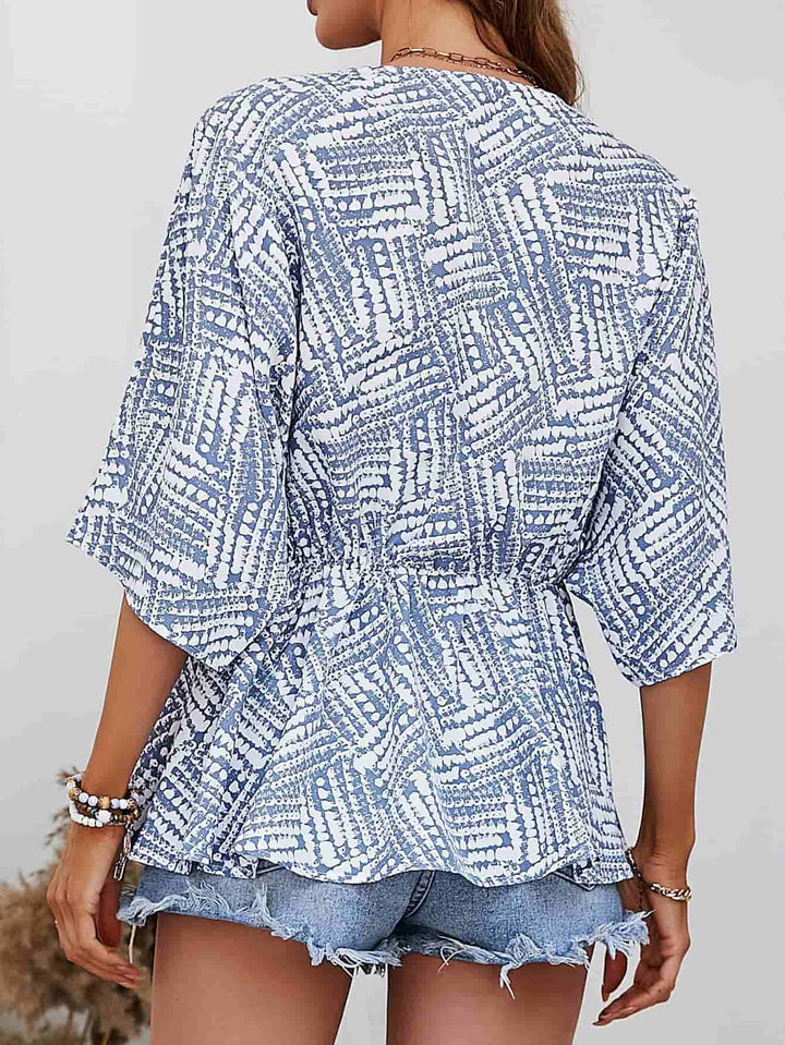 Abstract print V-neck dolman sleeve blouse