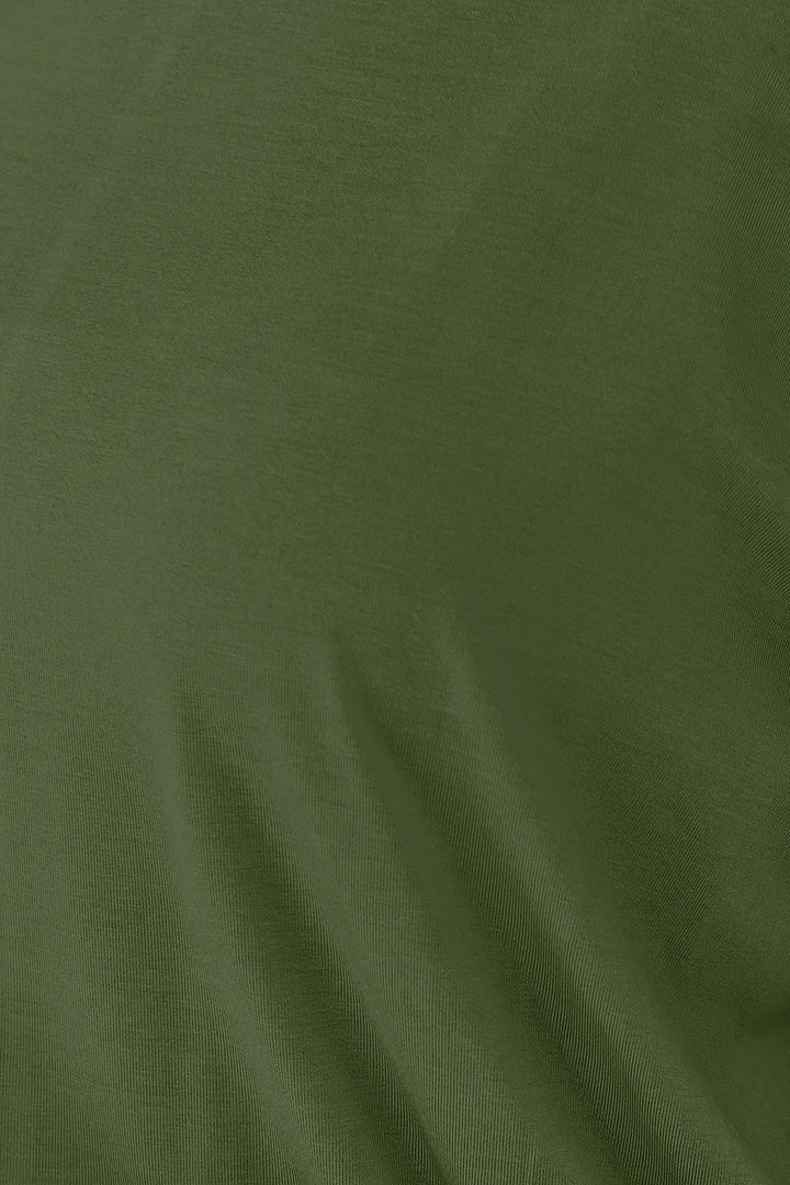 Batwing sleeve top with banded blouson hem