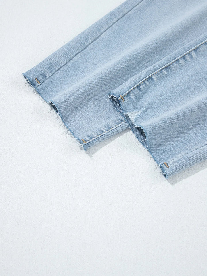 Distressed mid-rise ankle skinny jeans with raw hem