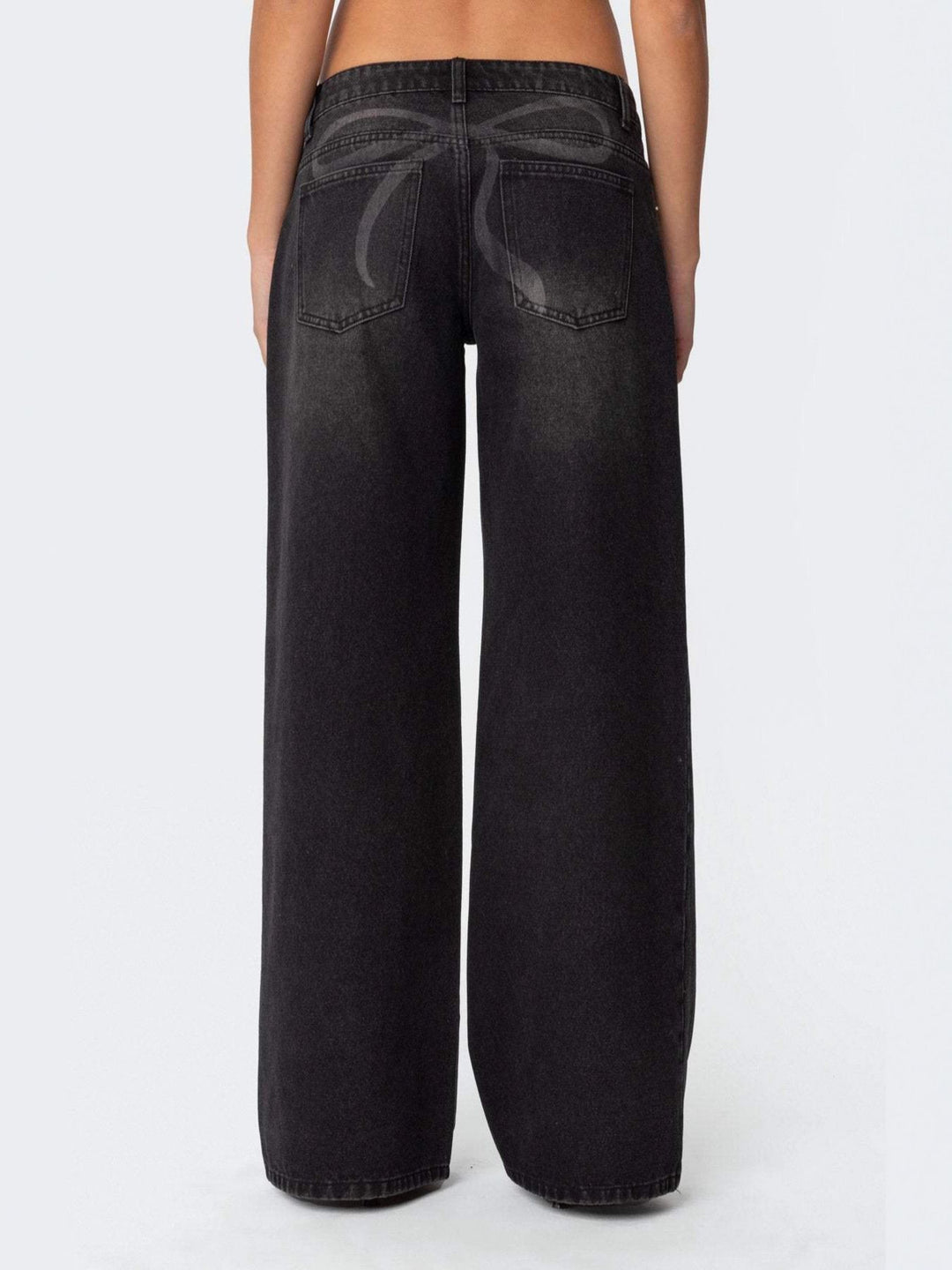 Vintage wash wide-leg jeans with whiskered fading