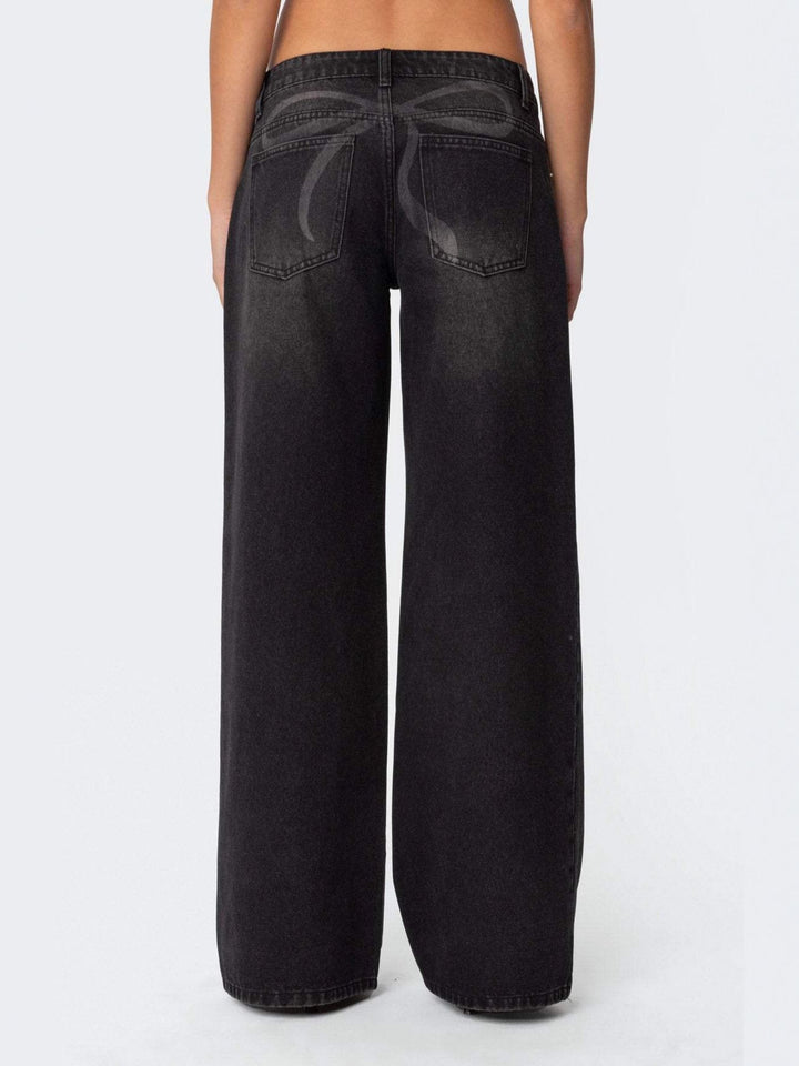 Vintage wash wide-leg jeans with whiskered fading