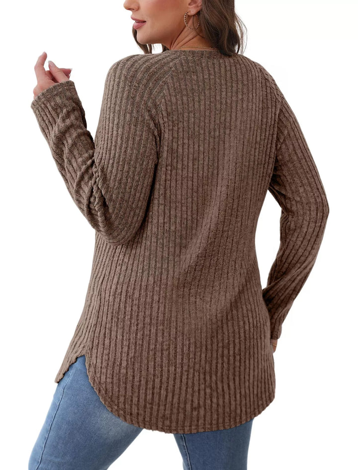 Ribbed knit crew neck long sleeve top with curved hem