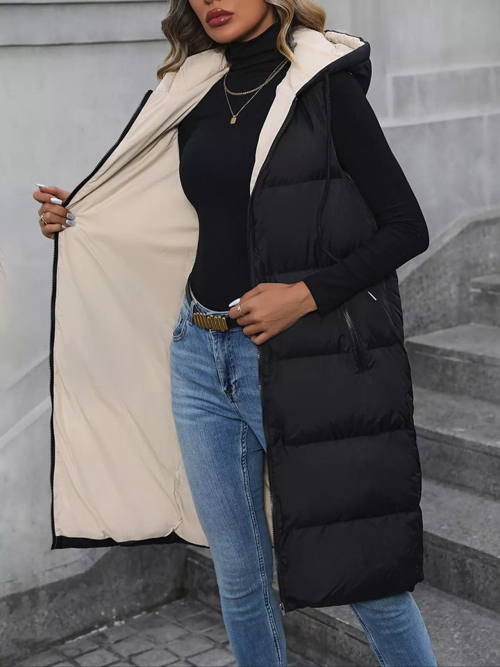 Longline hooded puffer vest with zip pockets
