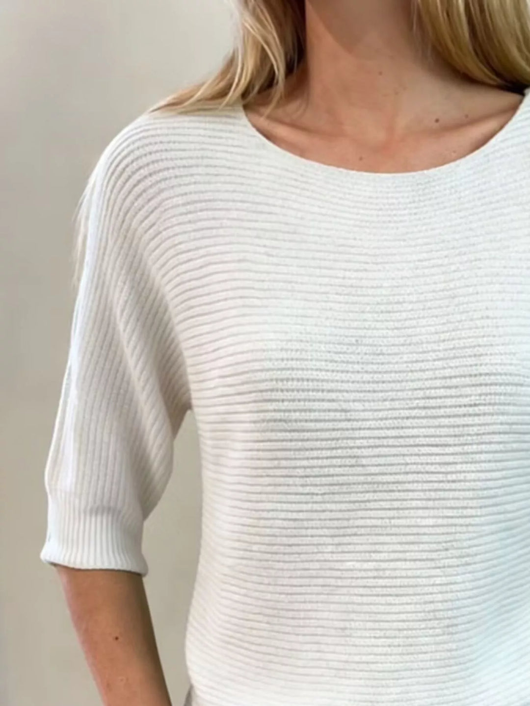 Ribbed knit round neck sweater with dolman sleeves