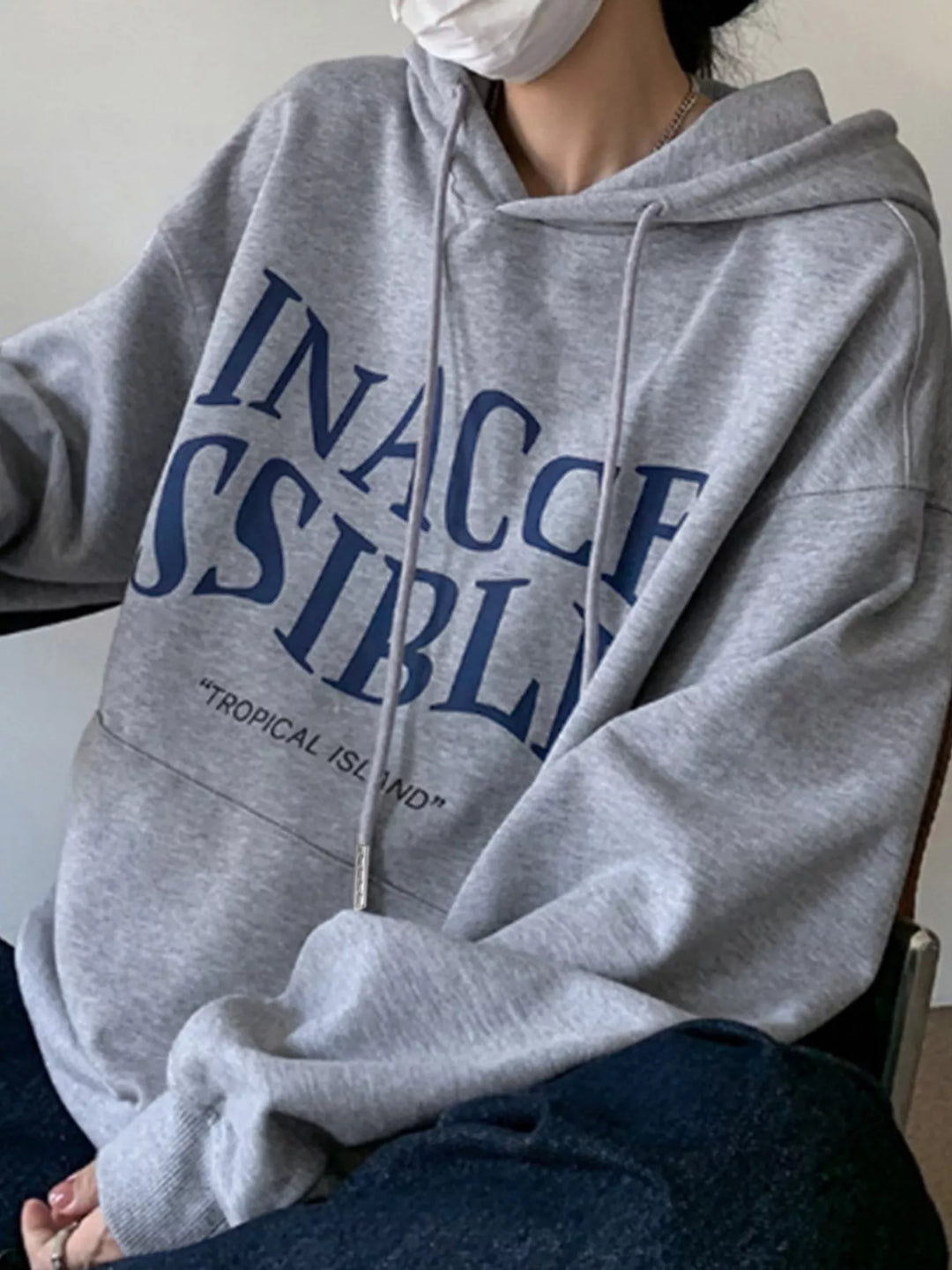 Oversized graphic pullover hoodie with kangaroo pocket