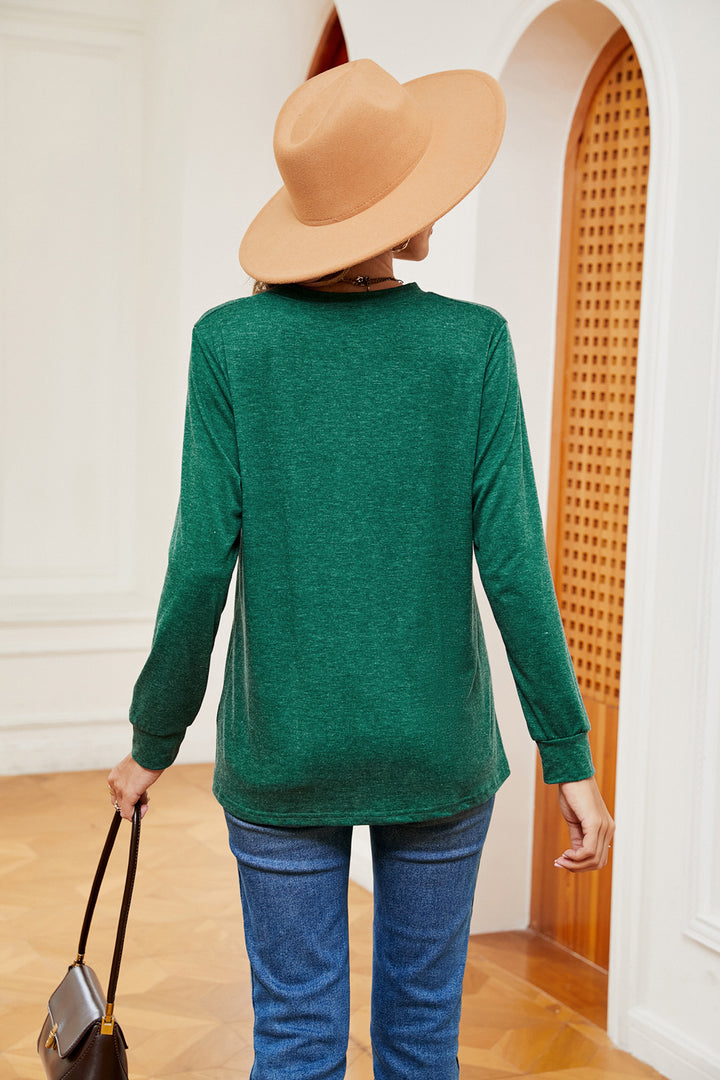 Notch neck long sleeve top with button placket
