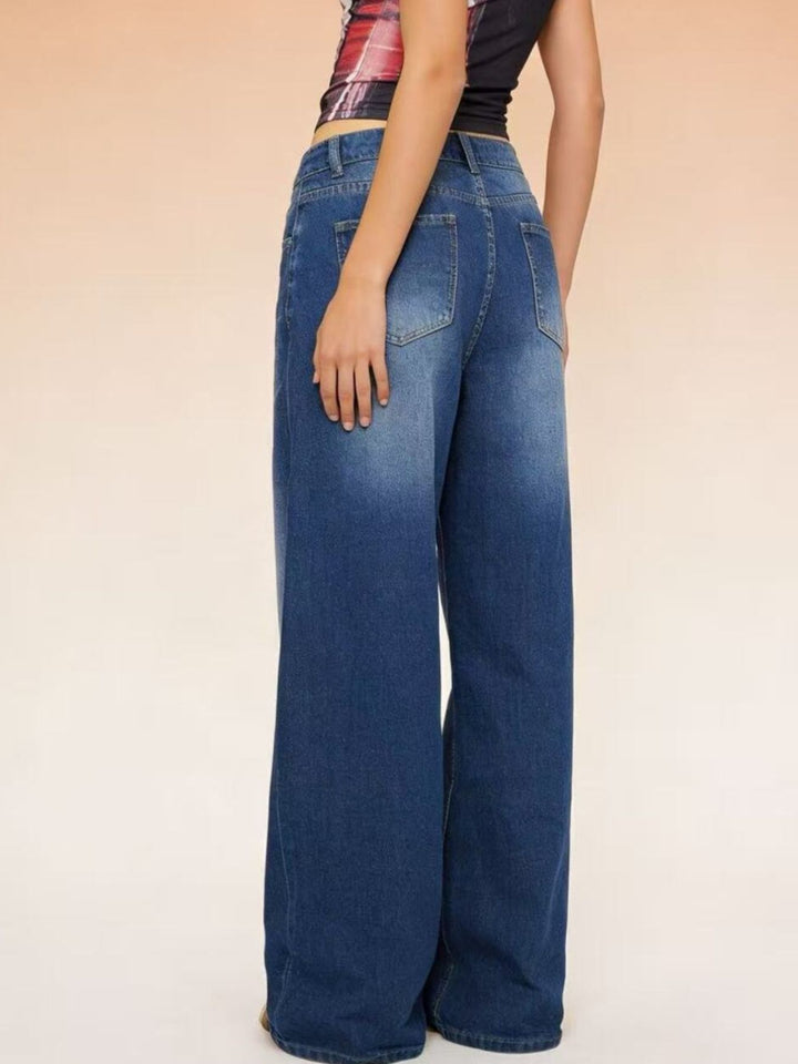 High-rise wide-leg jeans with whiskered fading