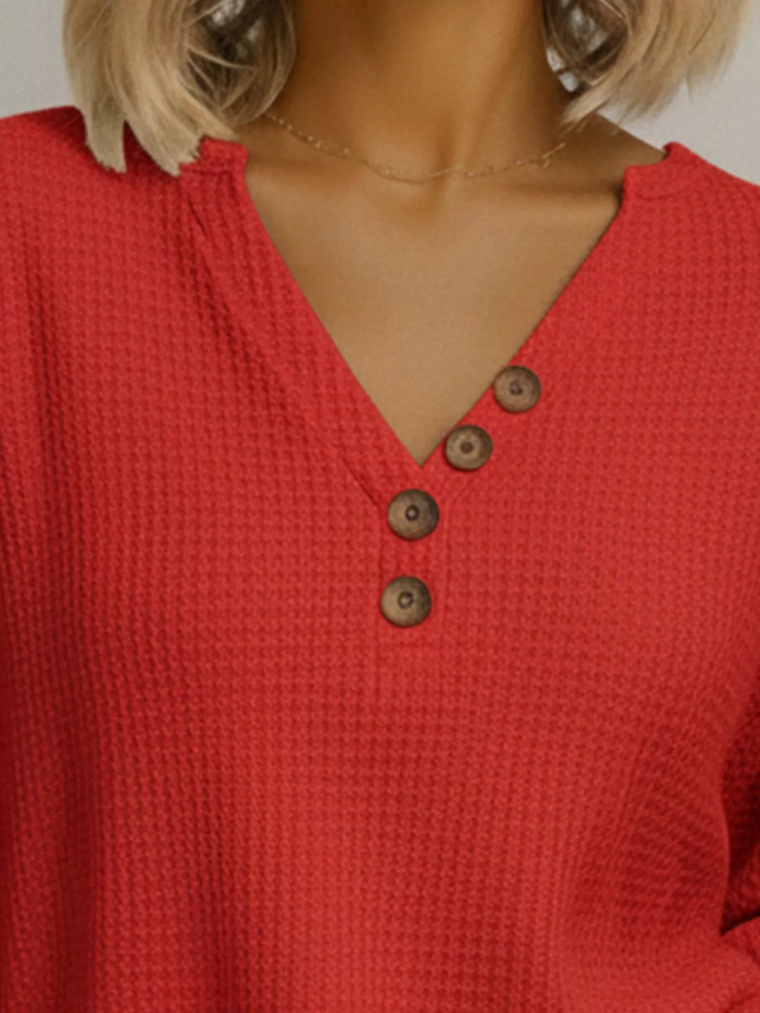 Waffle knit henley top with V-neck button placket