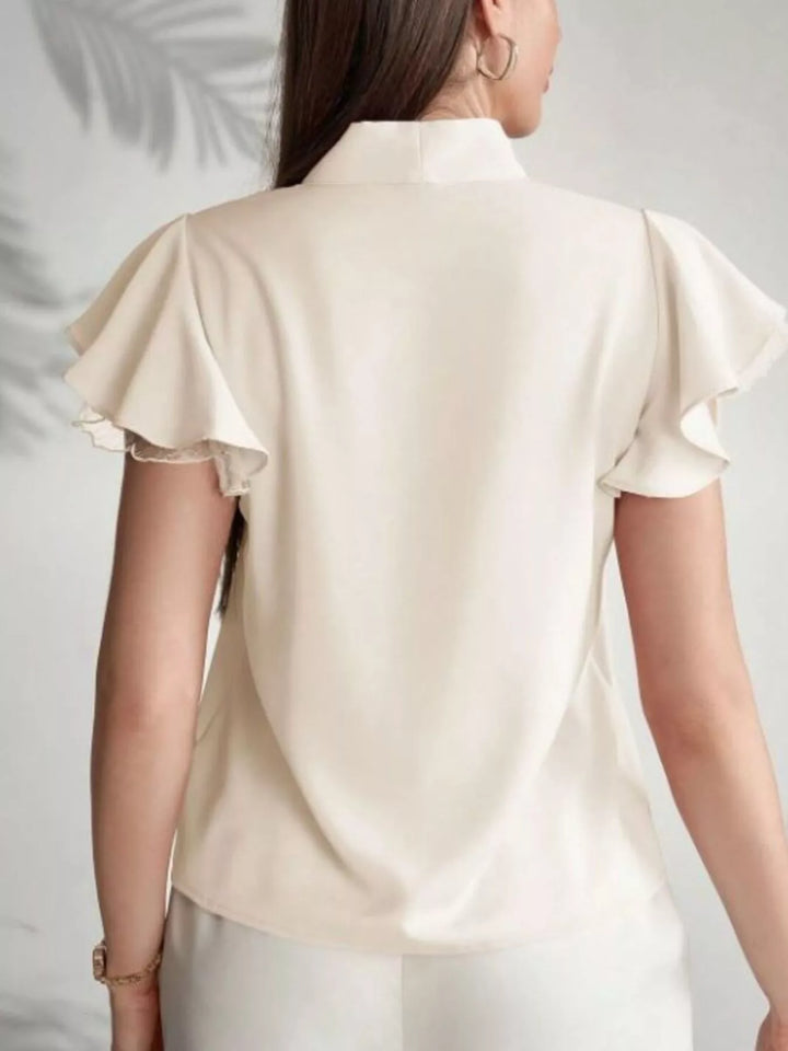 Tie-neck ruffle cap sleeve blouse with lace trim