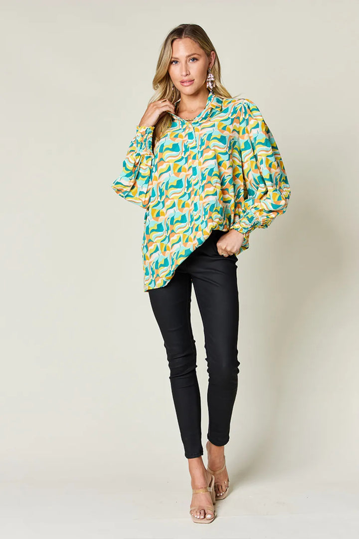 Abstract print smocked balloon sleeve blouse