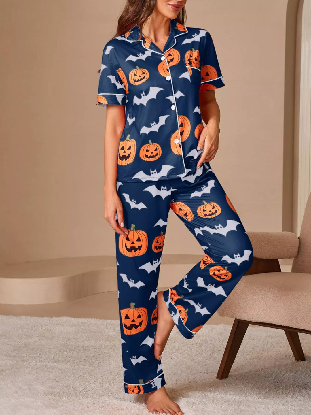 Pumpkin and bat print short sleeve pajama set with piped trim