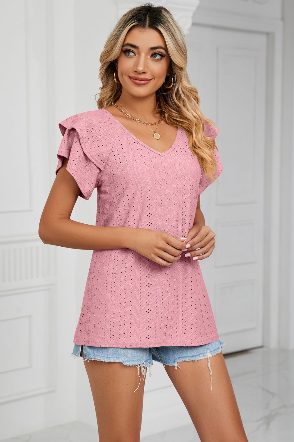 Eyelet knit V-neck top with layered flutter sleeves