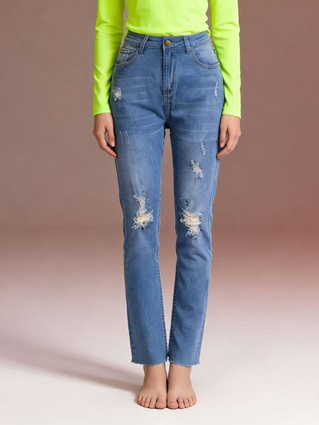 Distressed high-rise skinny jeans with frayed hem