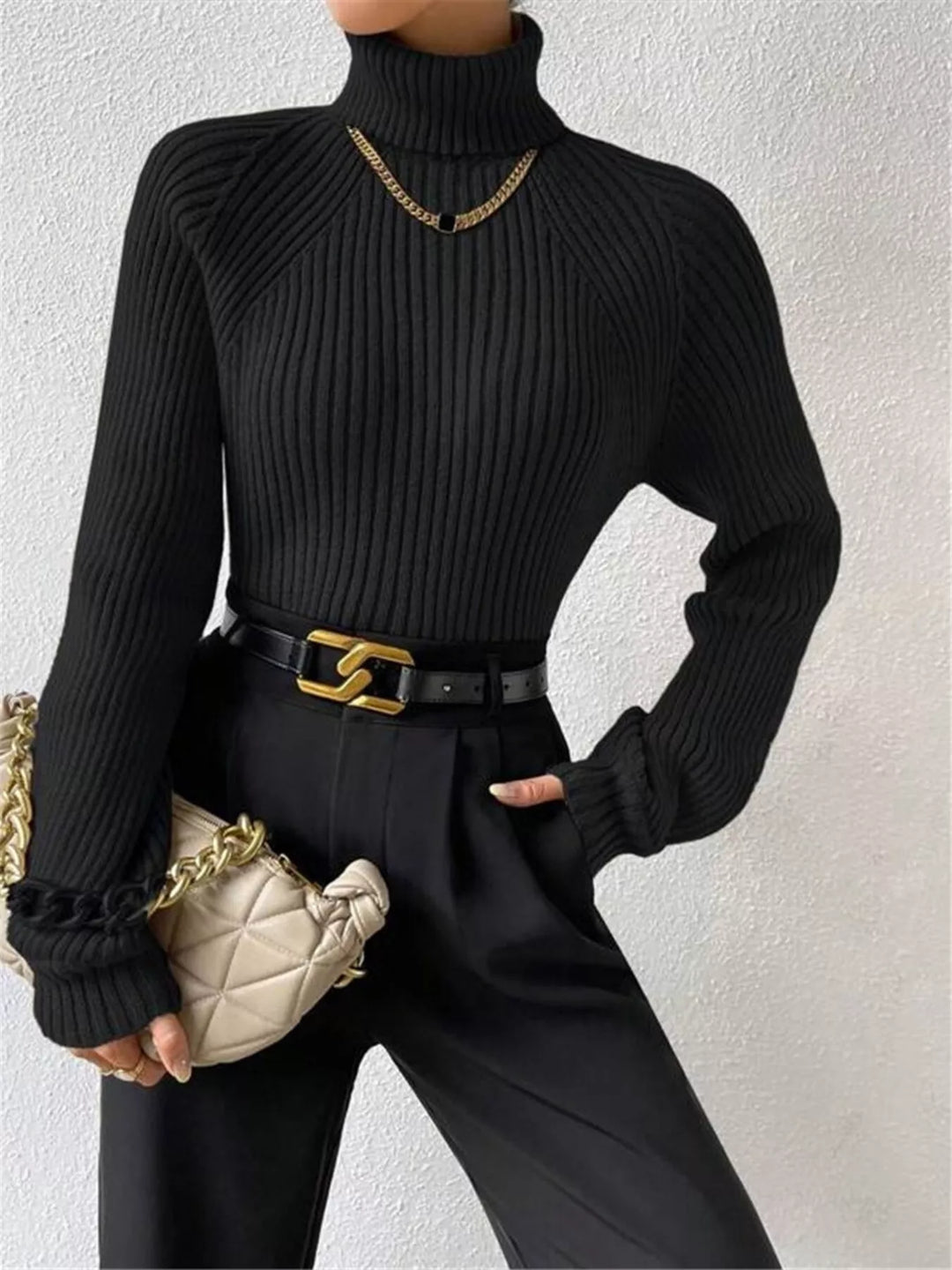Black Ribbed knit turtleneck sweater with fitted long sleeves