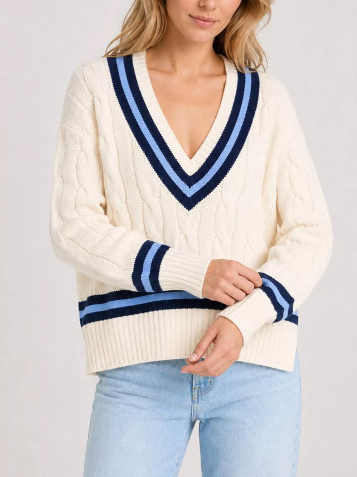 Cable knit v-neck cricket sweater with striped trim