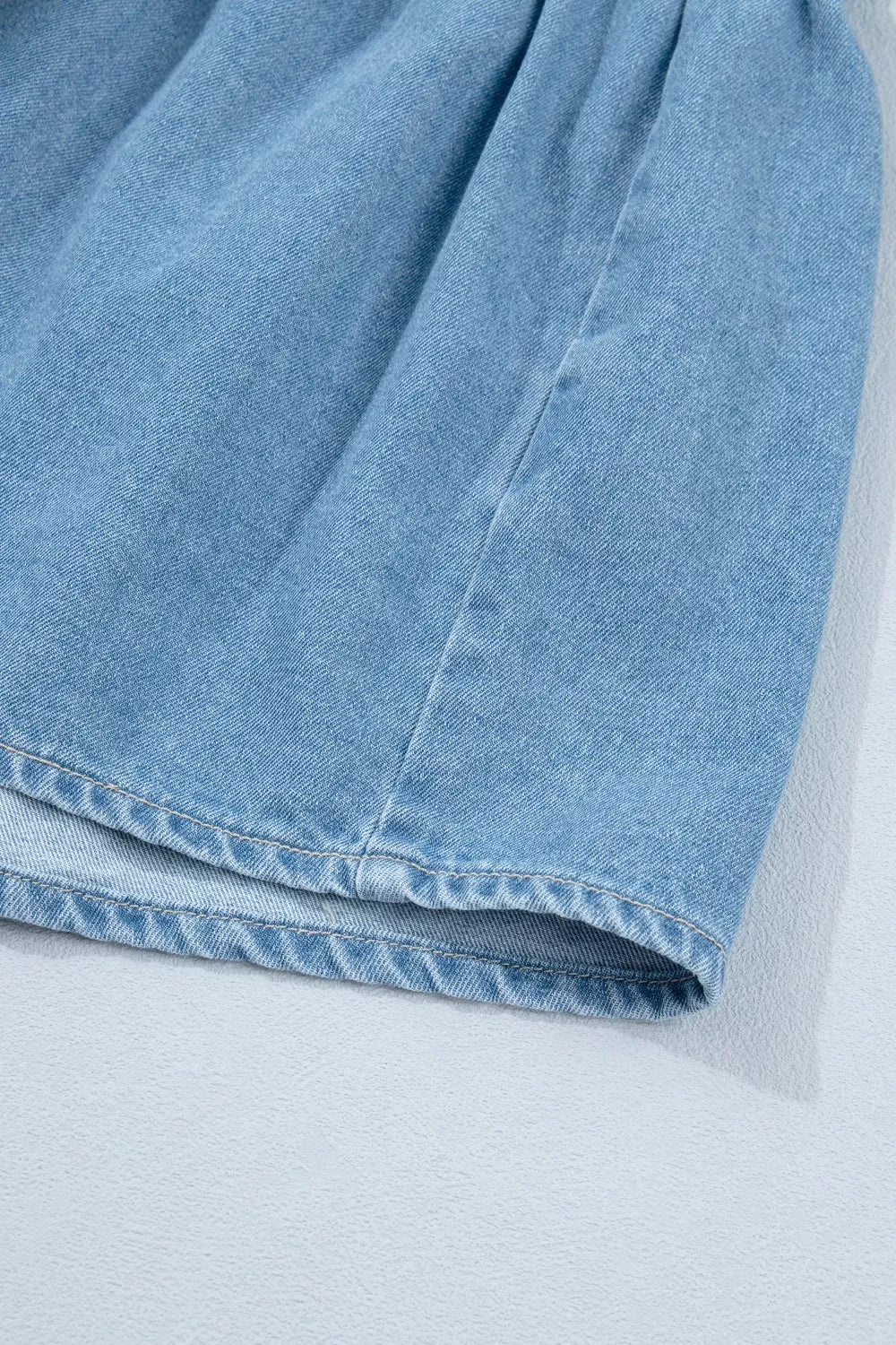 Button-down puff sleeve denim mini dress with ruffle hem