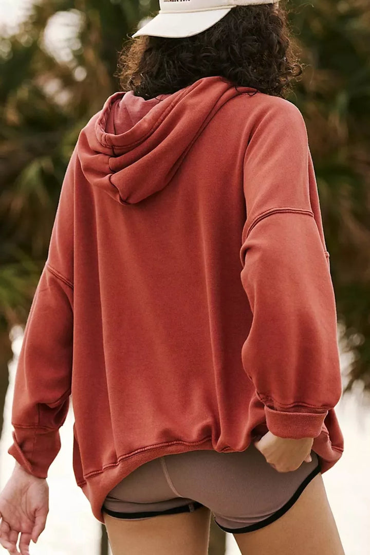 Oversized drawstring hoodie with dropped shoulders and pockets