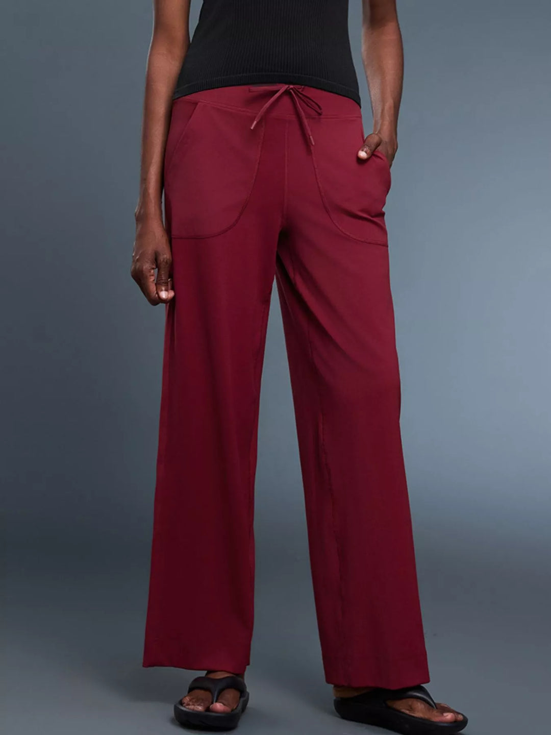 Wide-leg drawstring pants with curved front pockets
