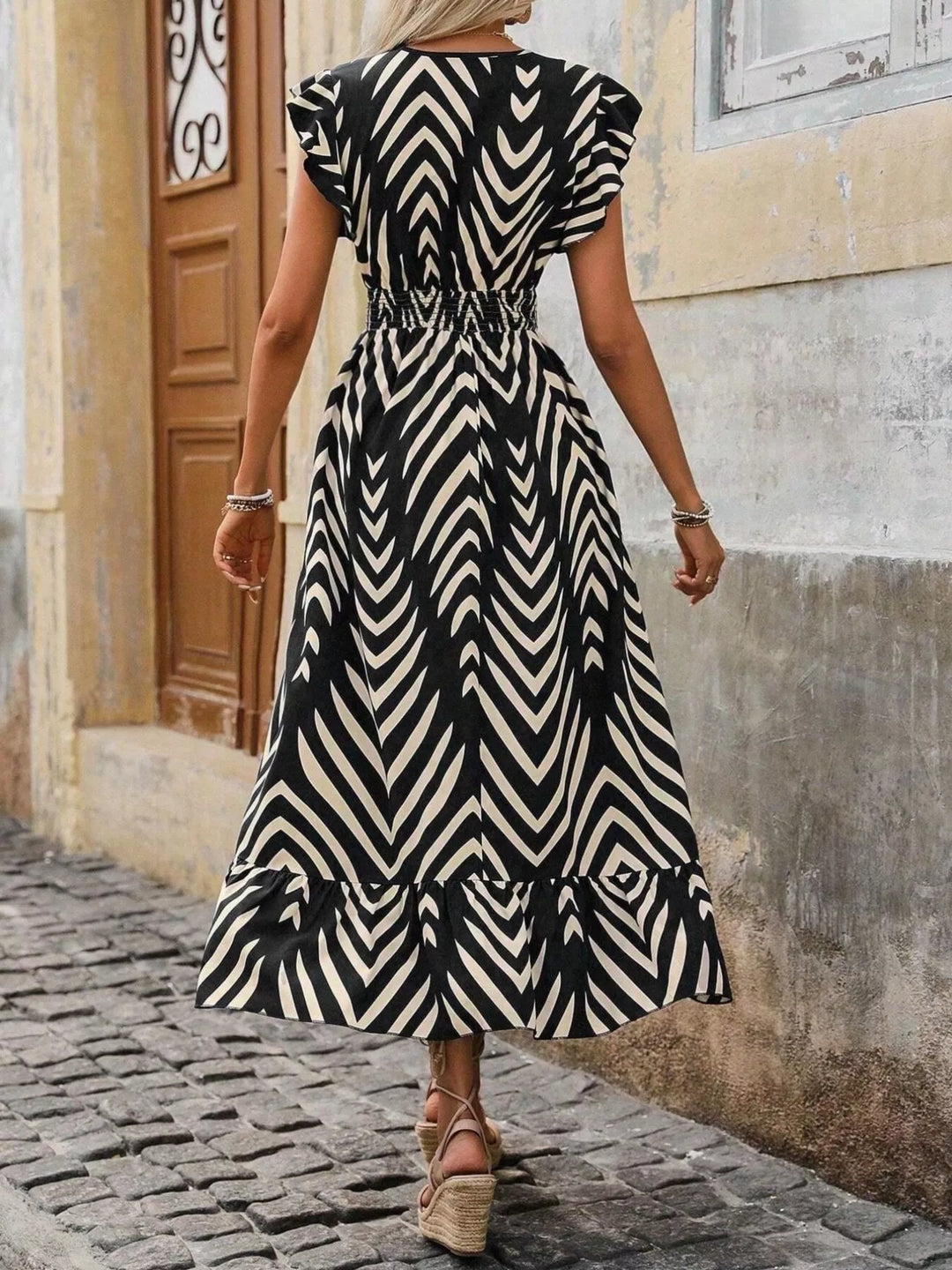 Geometric print midi dress with cap sleeves and smocked waist