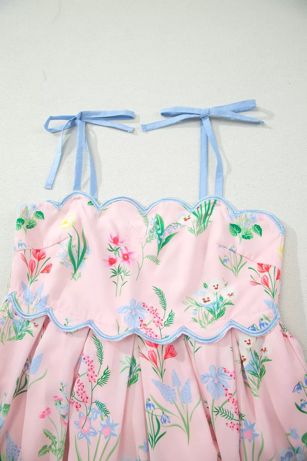 Floral midi dress with self-tie straps and scalloped trim