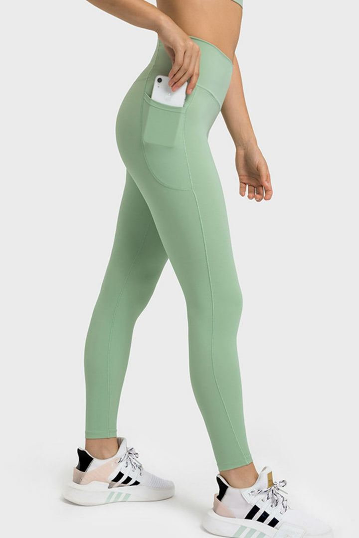 Crossover V-waist yoga leggings with side pockets
