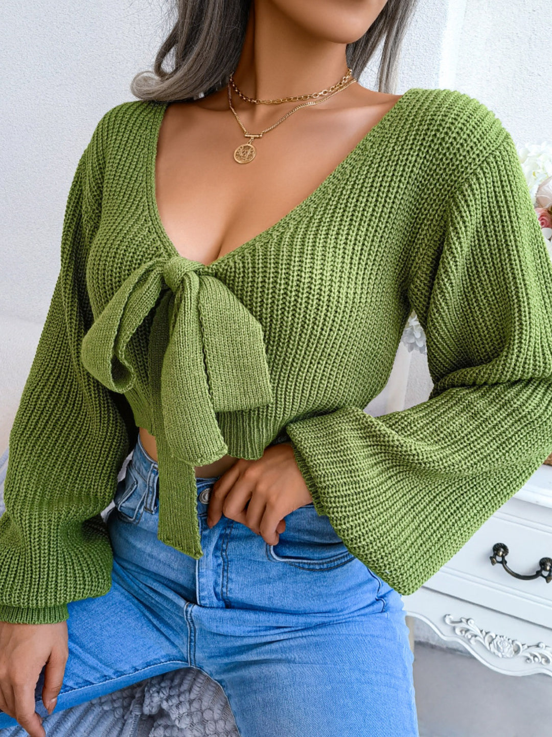 Tie-front ribbed knit cropped sweater with deep V-neck
