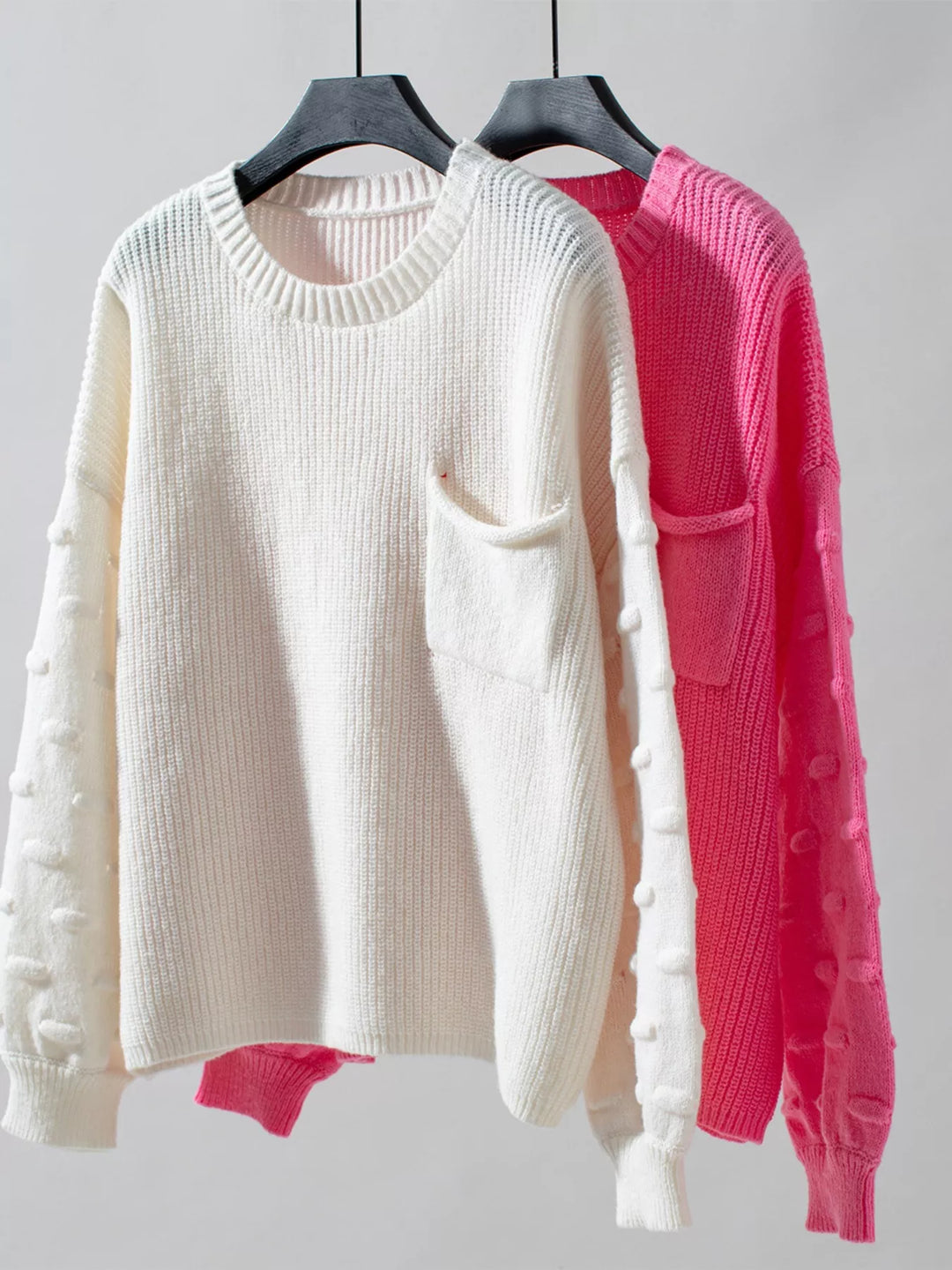 Ribbed knit round neck sweater with chest pocket