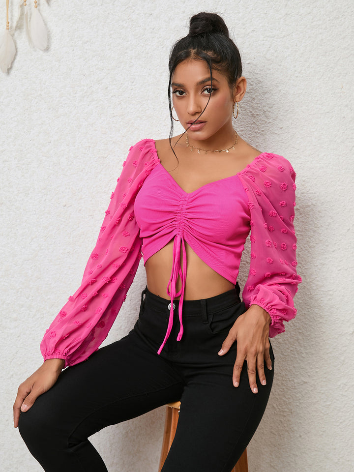 Hot Pink Ruched drawstring crop top with swiss dot sleeves