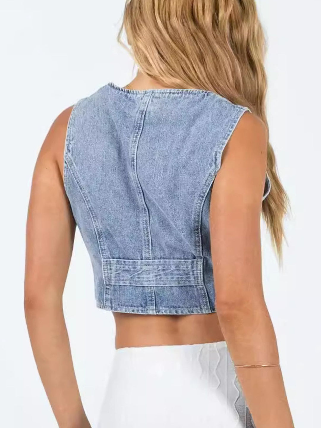 V-neck button-up cropped denim vest with welt pockets