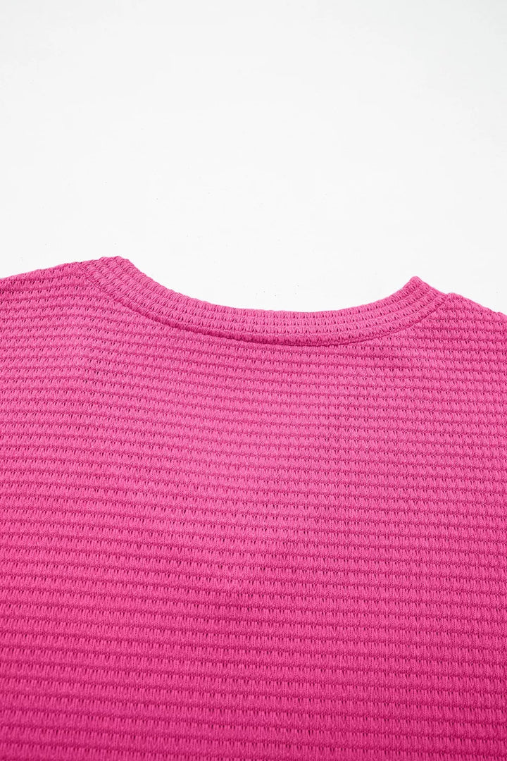 Waffle knit V-neck tee with cuffed short sleeves