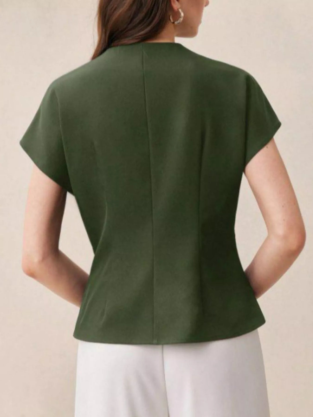 Wrap-front cap sleeve blouse with single wooden button