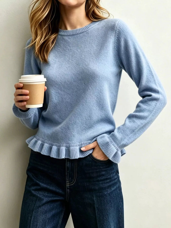 Ruffle hem crew neck knit sweater with ruffled cuffs