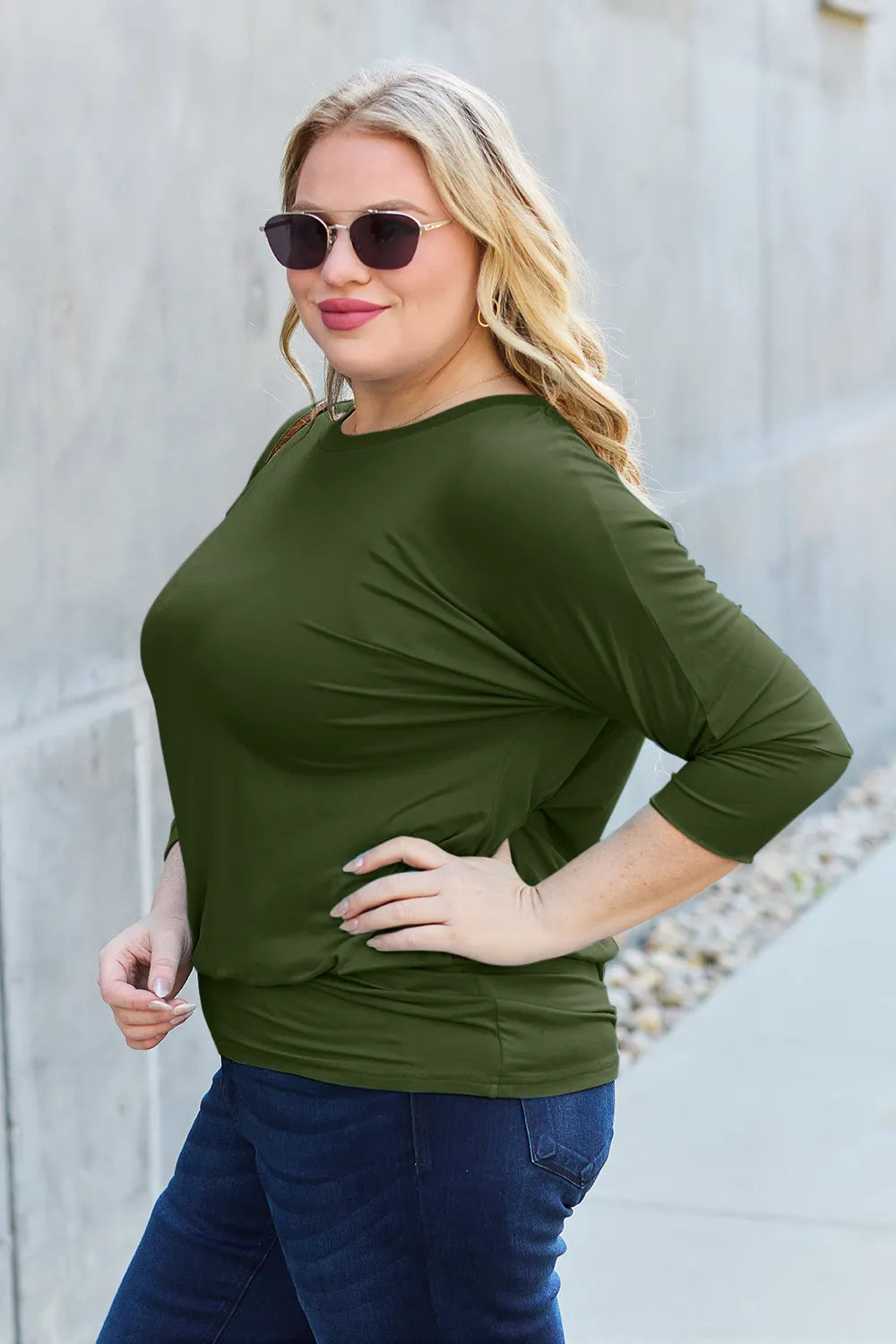 Batwing sleeve top with banded blouson hem