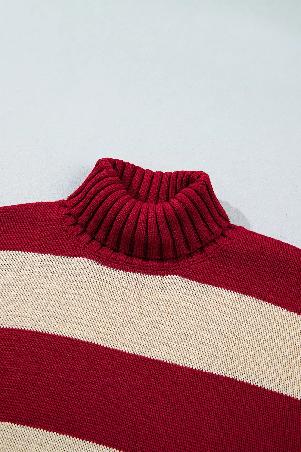 Striped turtleneck sweater with wide ribbed cuffs