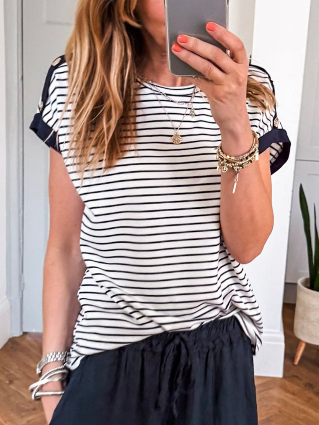 Striped short sleeve tee with button-trim cuffed sleeves