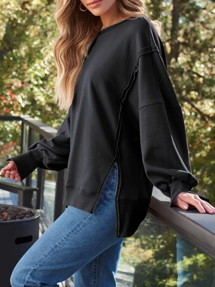 Oversized side-slit sweatshirt with exposed seams