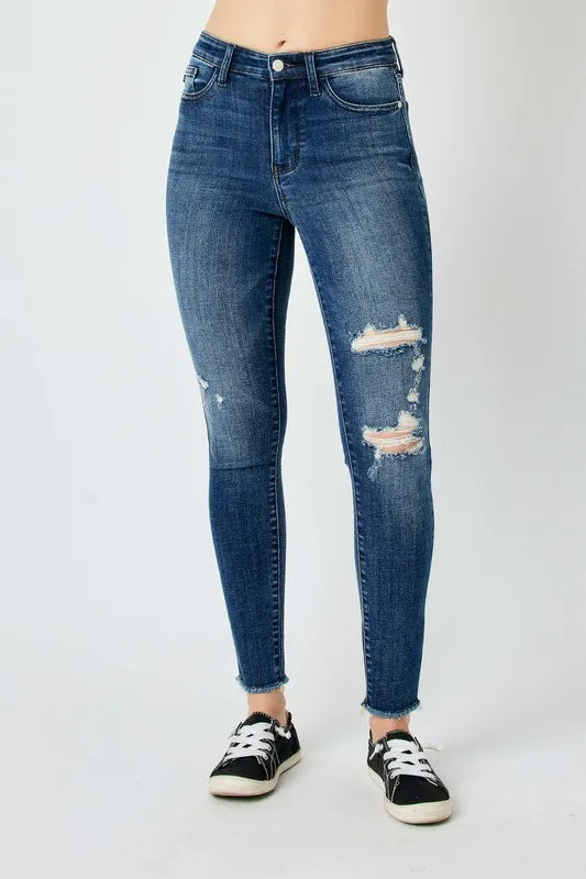 Dark Judy Blue high-rise distressed skinny jeans with frayed hem