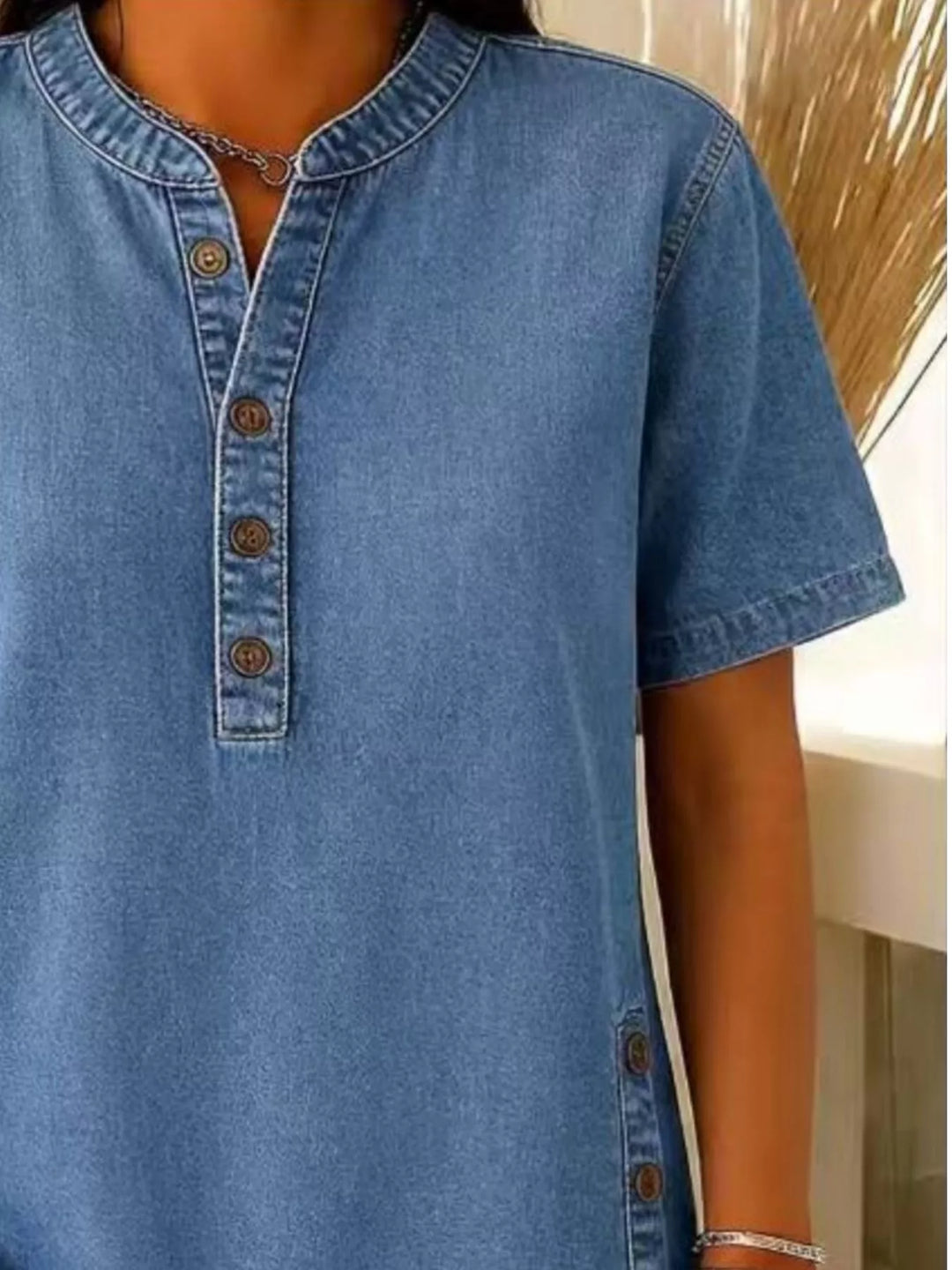 Denim-look button-front short sleeve blouse with side slits