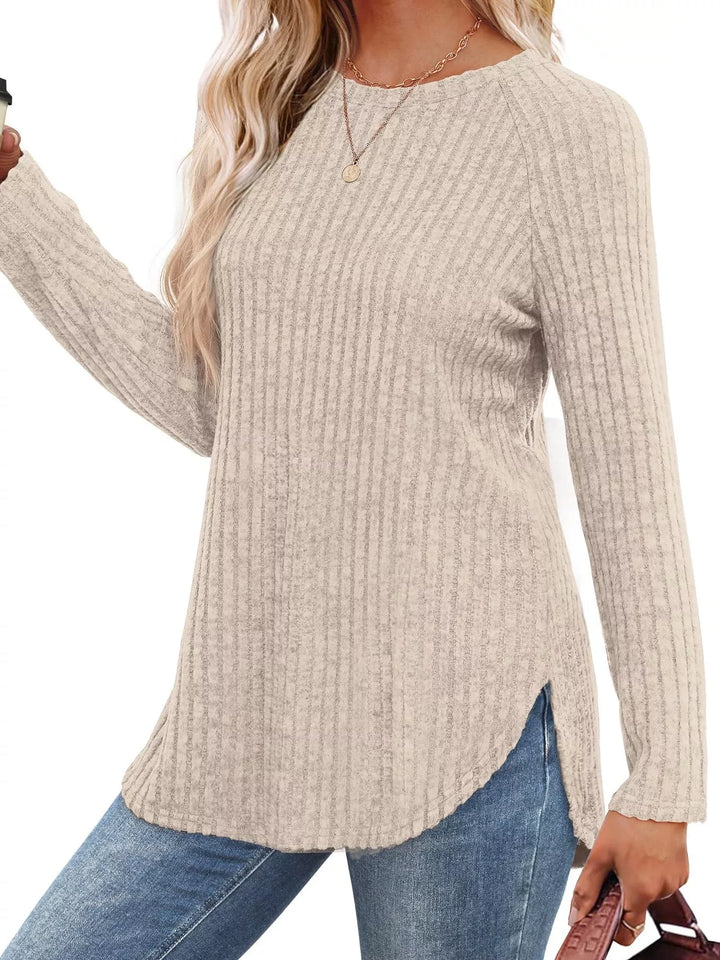 Ribbed knit crew neck long sleeve top with curved hem