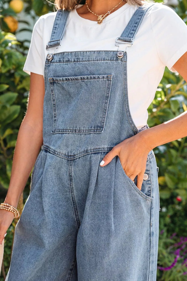 Pleated wide-leg denim overall jumpsuit with bib pocket
