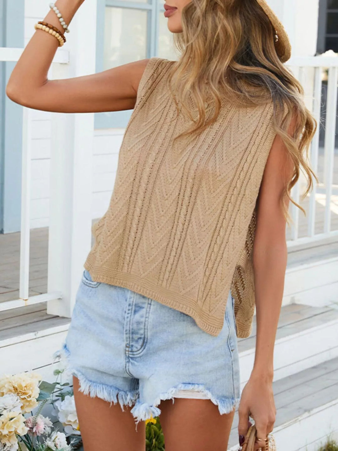 Cable knit sleeveless sweater vest with side slits