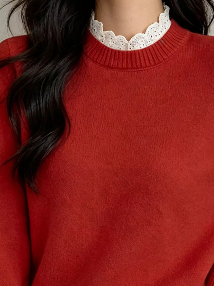 Lace trim crew neck sweater with buttoned ribbed cuffs