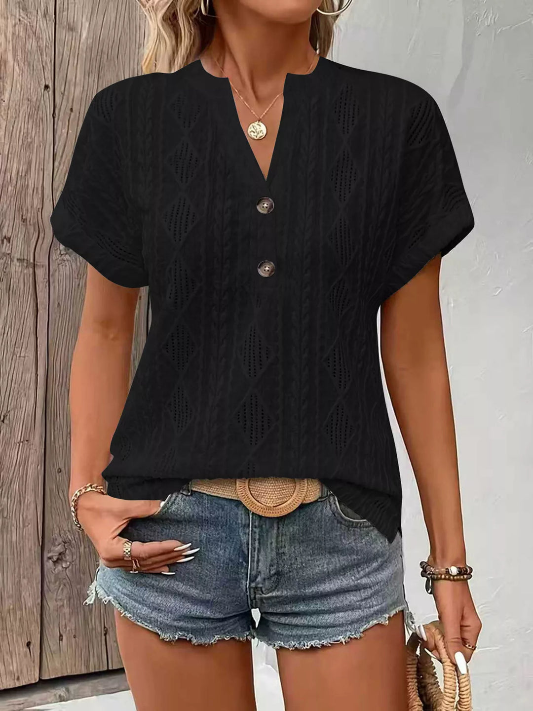 Black Diamond pointelle knit split-neck top with buttons