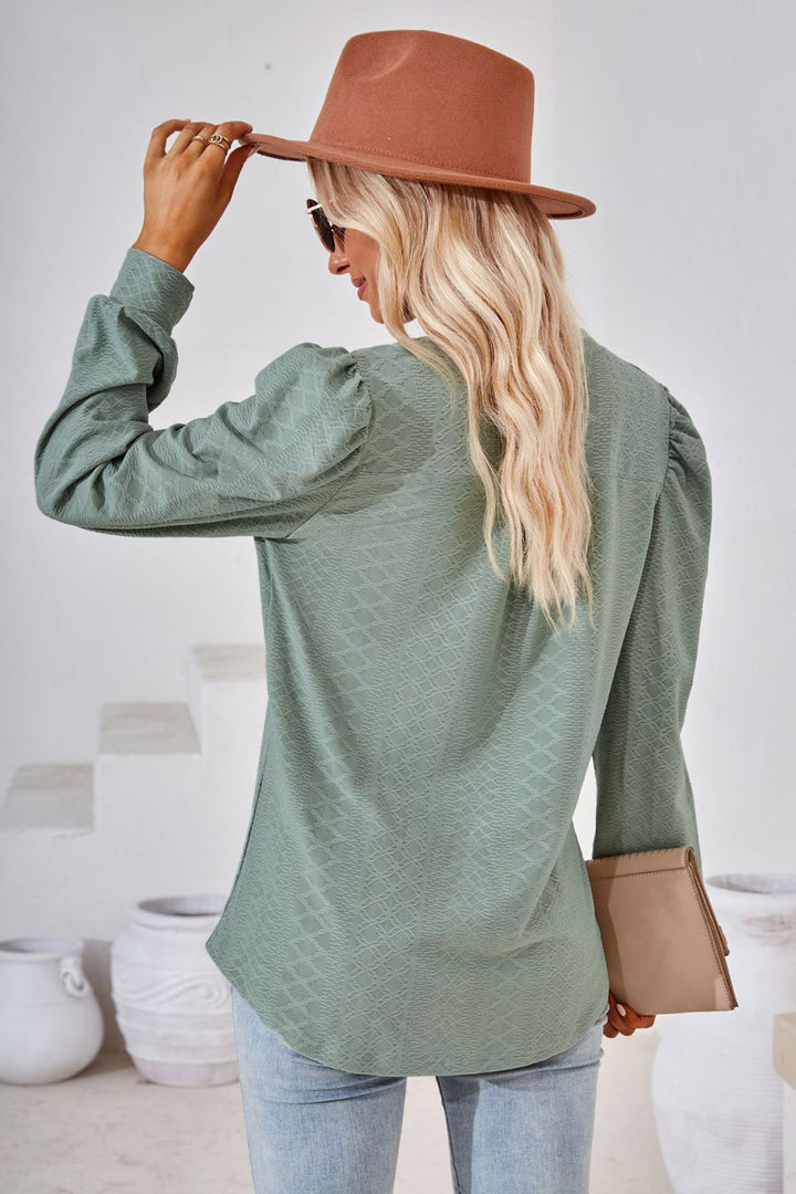 Textured knit split-neck puff sleeve blouse
