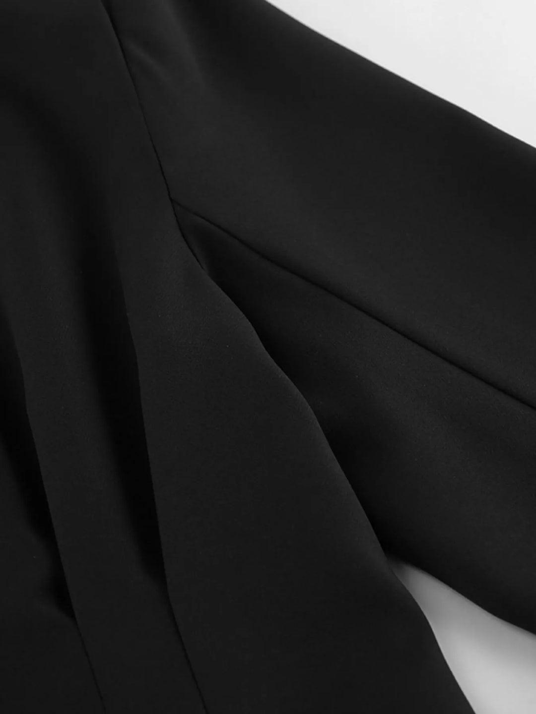 Collarless button-front jacket with cinched pleated waist