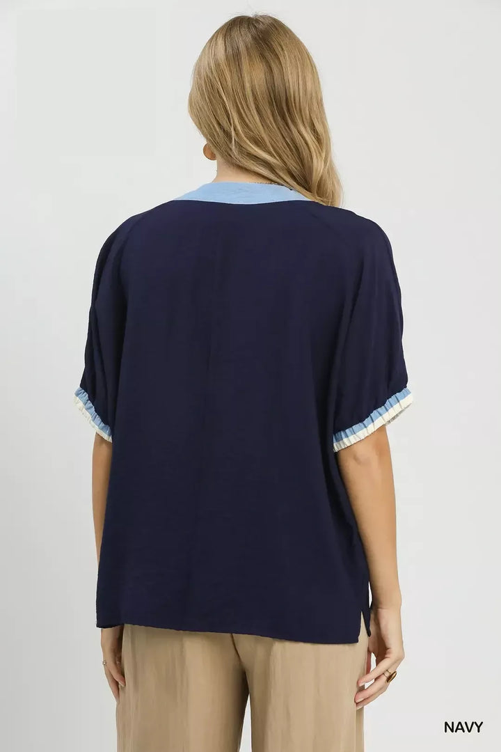 Embroidered floral V-neck boxy blouse with contrast trim